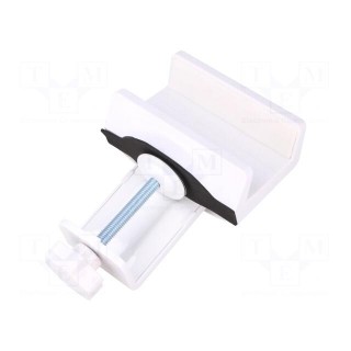 Cable organizer | white | on the edge of a desk or shelf